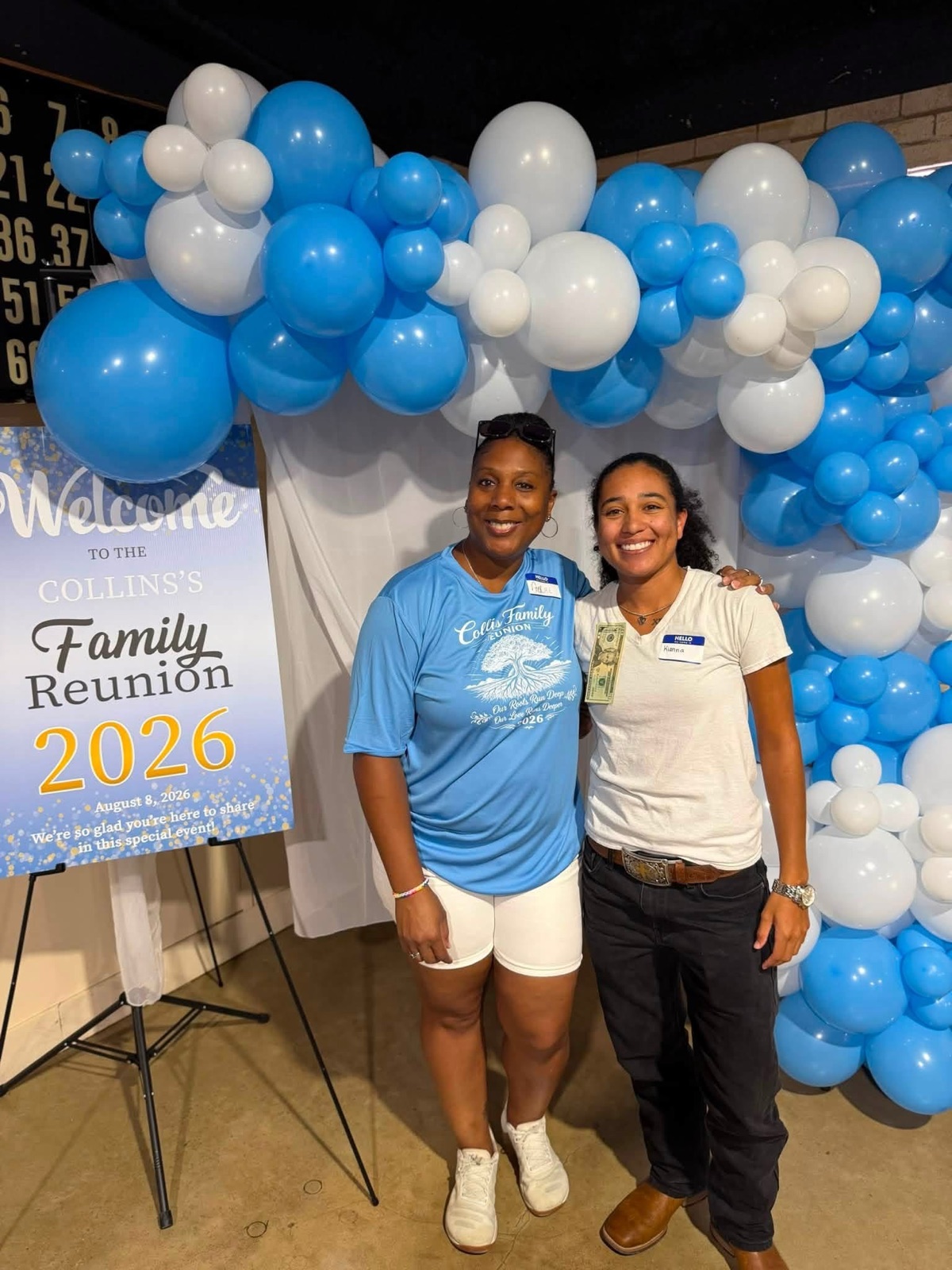 Family at the Welcome to the Collins Family Reunion 2026 sign