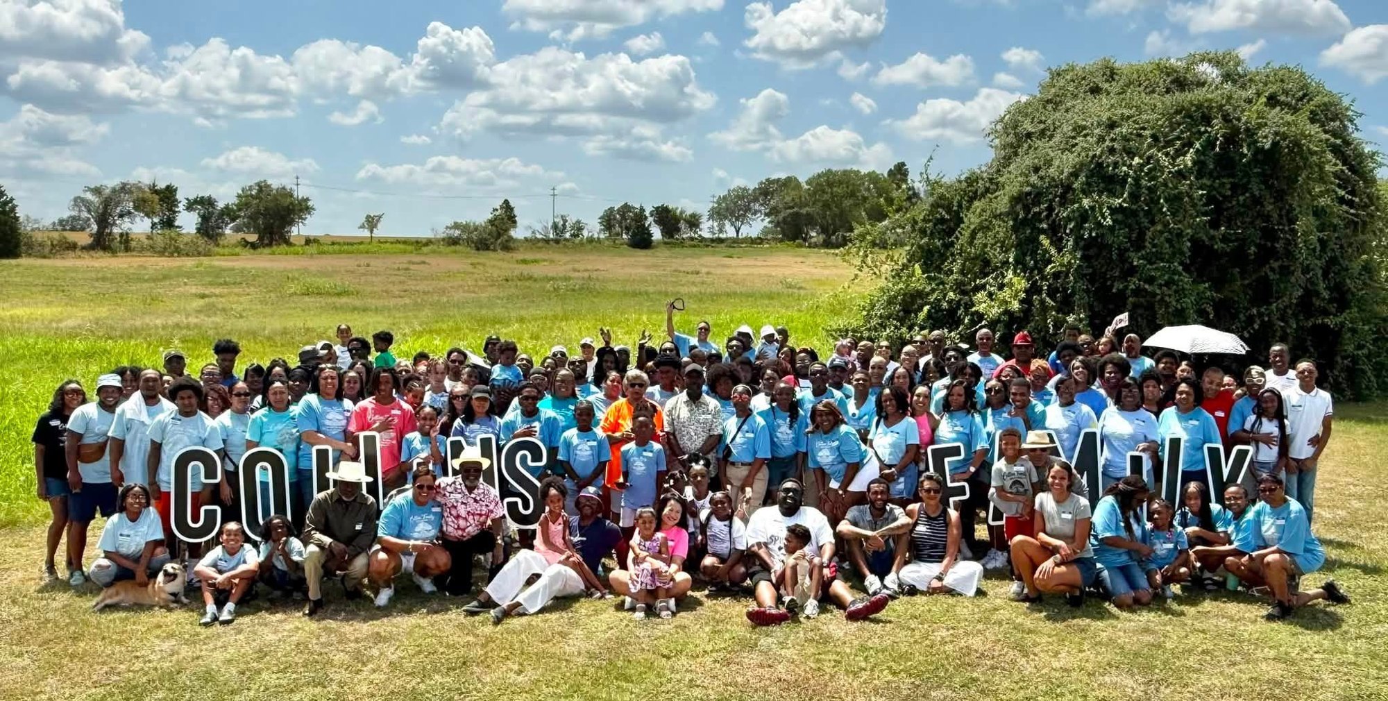Collins Family Reunion 2026 — the whole family behind the COLLINS FAMILY letters in Elgin, Texas